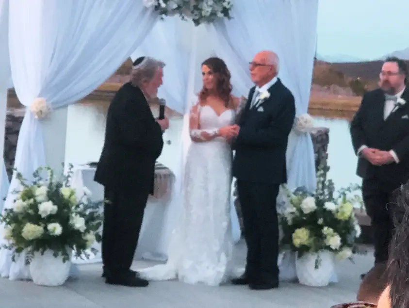 Mel Hecht performing a wedding